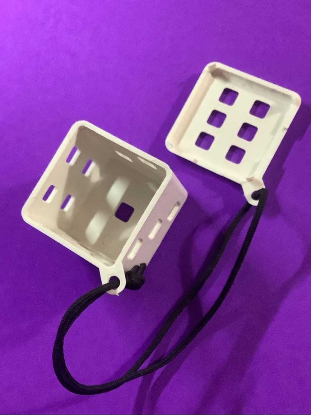 1 Plastic Tub White Colored Dice Black with Smooth Rope Cord